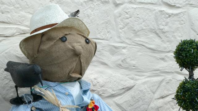 A scarecrow face made of sacking