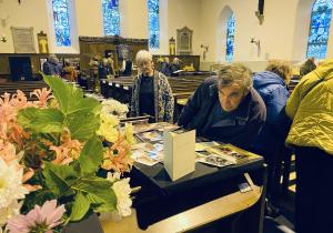 Visitors looking at the Colmonell church exhibits