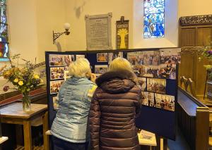 Visitors looking at the exhibits